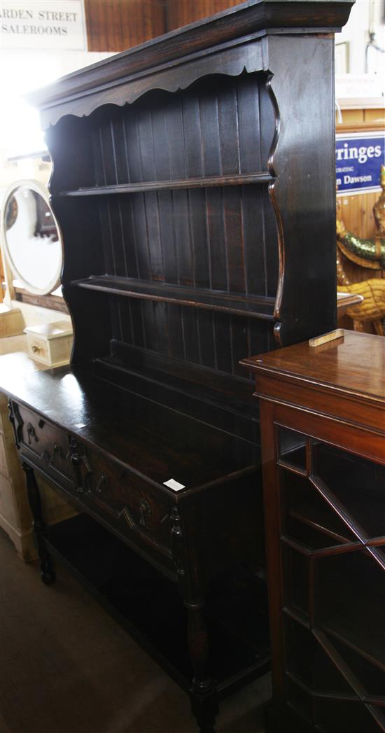 Jacobean style oak dresser with open shelved back over 2 drawers